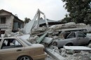 Percorriamo le strade di Port-au-Prince, in Haiti, attraverso le terribili immagini diffuse dall'Agenzia italiana 